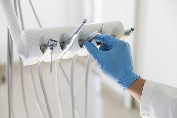 Professional Teeth Whitening technician working in Cedar Grove, FL